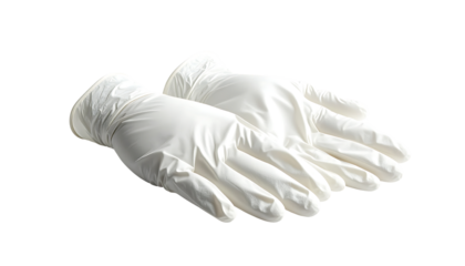 A pair of pristine white, disposable nitrile gloves, slightly creased, lie palms up against a black background
