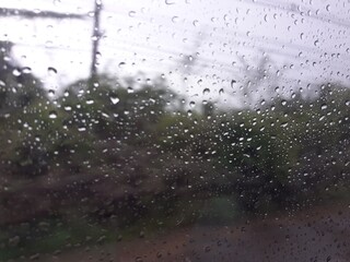 Scenic view of nature along a rural road after a rainy day