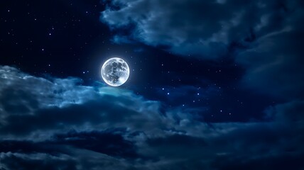 Mysterious glowing full moon illuminating dramatic dark clouds and twinkling stars in a vast night sky