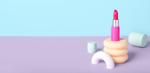 Decorative podiums with lipstick on color background with space for text