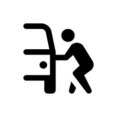 Person pushing a boxy object with rounded corners and a small circle attached to its side in black silhouette