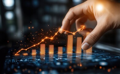 Hand pushing upward a glowing chart