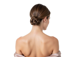 Elegant hairstyle inspiration for special occasions featuring a classic bun on a model with smooth skin