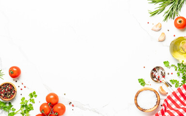 Spices, herbs, olive oil and fresh tomatoes.