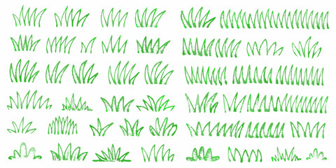 Collection of hand drawn green grass illustrations with a brush stroke texture on a white background