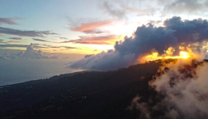 Sunrise over a misty mountain range