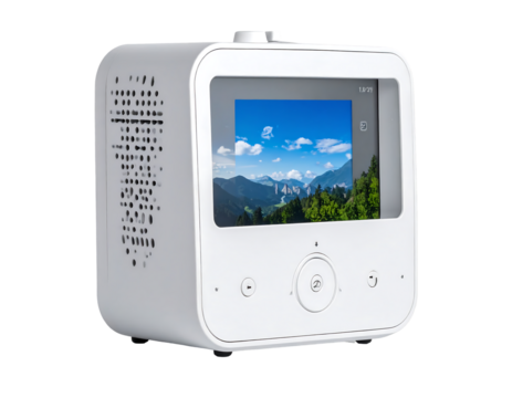 White cube-shaped device with a small screen displaying a scenic landscape, featuring a circular control button and perforated speaker grill