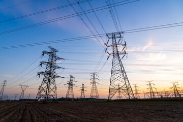 The pylons are in the evening, Substation in the evening, High voltage substation and beautiful sunset glow