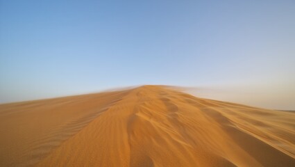 Tall Sand Dune in Vast Desert