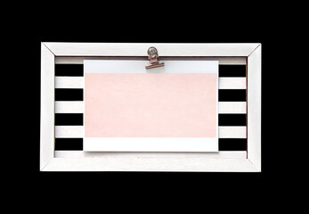 Retro wooden frame with blank paper sheet. Vintage style mood board layout. Vintage wooden empty picture frame. Copy space for text. Isolated on black background