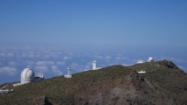 Telescopes of the Roque de Los Muchachos Astrophysical Observatory above the clouds in La Palma
