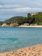 Sunny beach view with blue sea water horizon sandy coastline seascape summer vacation travel tourism ocean waves nature landscape