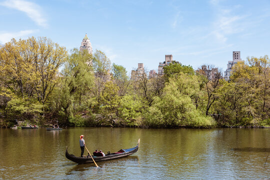 Boat with tourists in springtime, Central Park, New York city, USA