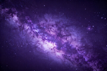 Fototapeta premium A stunning view of a spiral galaxy with vibrant purple and blue hues, showcasing star clusters and cosmic dust in deep space.