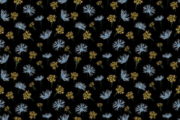 Seamless vector pattern with hand drawn wildflowers in soft blue and golden yellow tones on a black background. Template for elegant textiles, dark-themed packaging, or botanical design