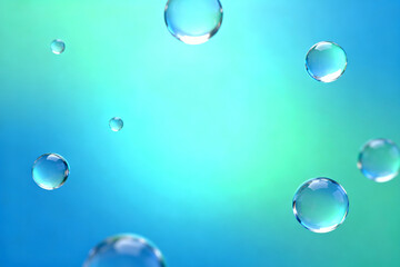 Floating water droplets against a gradient blue and green background