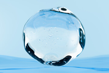 Blue transparent water gel drop with air bubbles on water surface background. Abstract cosmetic texture, skincare serum or hyaluronic acid concept. Clean, minimal design beauty and moisturizer cream.