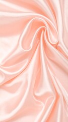 Fototapeta premium Closeup of soft, pale peach silk fabric