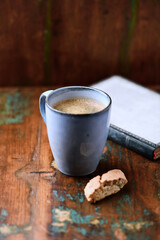 Cup of coffee on rustic wooden background. Soft focus. Copy space	