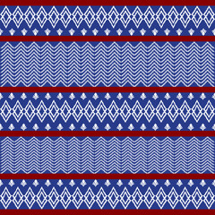 Motif ethnic ikat pattern seamless textile. Antique pattern, white flowers, navy blue and red background.