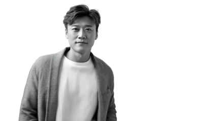 Confident Individual: A sophisticated man exudes confidence in a striking grayscale portrait. The portrait embodies a sense of understated elegance, power, and composure.