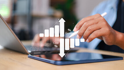 Businessman hand using digital pen with cost vs quality graph on tablet. Modern data analytics, business strategy, financial management, and decision making concept.