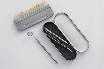 Various dental instruments arranged neatly, showcasing precision tools vital for effective...