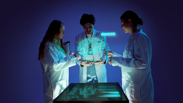 Bold artwork. Group of doctors analyzing holographic brain projection with collaborative emotion. Concept of teamwork, neuroscience, healthcare branding, education, and digital innovation in medicine.