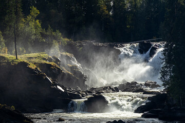 Ristafallet waterfall, Indalsälven river, in Jämtland, Sweden. 14 metres high natural powerful water energy.