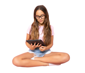 Young student girl sitting on floor and using a tablet isolated over transparent background. PNG transparent