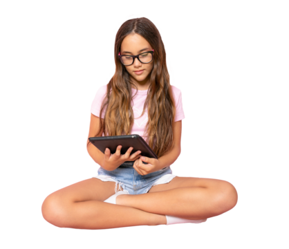 Young student girl sitting on floor and using a tablet isolated over transparent background. PNG transparent