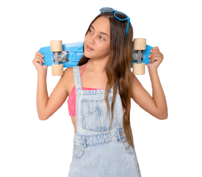 Young girl with skateboard. Fashion child in trendy style on transparent background. Happy teenager, positive and smiling emotions of teen girl. PNG transparent