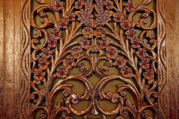 Intricate Gold Decorative Panel with Floral and Gemstone Designs
