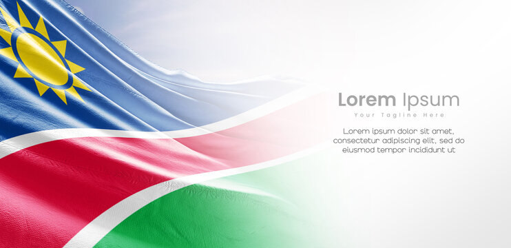 Namibia national flag waving and fading on white background. The flag uses for banner and poster with text. Namibia national flag for independence day.