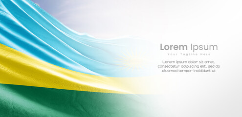 Obraz premium Rwanda national flag waving and fading on white background. The flag uses for banner and poster with text. Rwanda national flag for independence day.