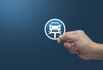 Hand holding service fix car with wrench tool flat icon in fingers over light blue background, Business repair car service concept