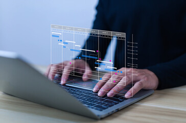 Businessman working on laptop with project management dashboard and Gantt chart, concept of business planning, task scheduling, productivity, workflow strategy, and digital technology.