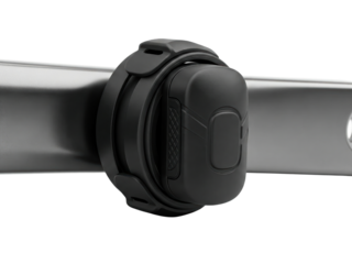 Cycling cadence sensor mounted on a bicycle crank for training on a transparent background