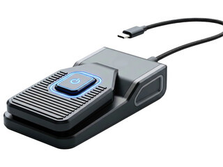 Black computer foot switch with a glowing blue power button on a transparent background