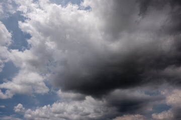 Obraz premium Dark sky with stormy clouds. Dramatic sky rain,Dark clouds before a thunder-storm,clouds before rain