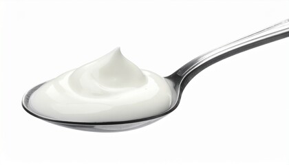 Metallic spoon holding thick white dollop of yogurt or sour cream, smooth texture with peak, isolated on plain white background.