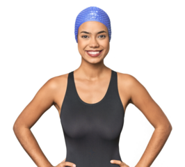 Pro Latina swimmer in studio gear confident keeping hands on hips.