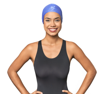 Pro Latina swimmer in studio gear confident keeping hands on hips.