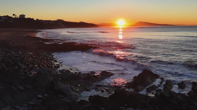Rocky Uhabia beach of Bidarte hit by the sunset at the Basque Country.