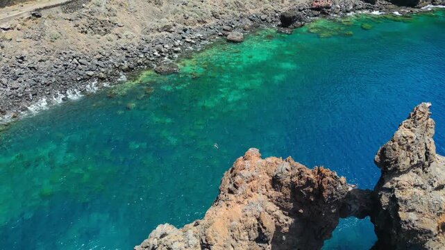 Roque de Bonanza is one of the symbols of El Hierro island and its natives. Huge Rock sticking out of the water on the las Almorranas beach. El Hierro, Canary islands, Spain, Europe	