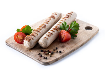 Grilled Bratwurst sausages with cherry tomatoes and parsley isolated on white background