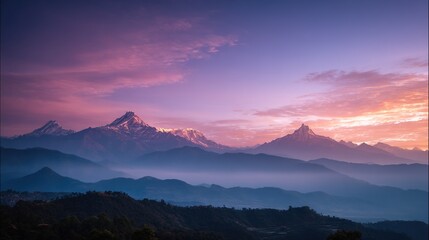 Obraz premium Majestic mountains stand tall under the twilight sky, where soft pink and purple hues blend gently with misty peaks, crafting an ethereal landscape that radiates calm and otherworldly beauty.