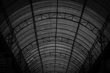 Monochromatic Industrial Interior Arch Structure Roof Detail of Warehouse Building
