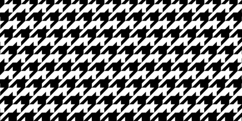 Houndstooth pattern. Dog tooth background. Plaid, scarf or cloth woven fabric print. Pied de poule textile motif. Retro tweed textile design. Classic monochrome ornament. Vector graphic illustration.