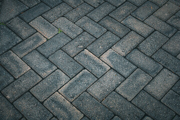 Dark Herringbone Patterned Stone Pavement Surface Detailed Close-up Material Texture
